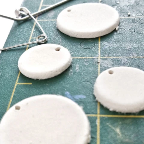 Use La Doll air dry clay to create beautiful boho earrings.  Get the full tutorial in this post!